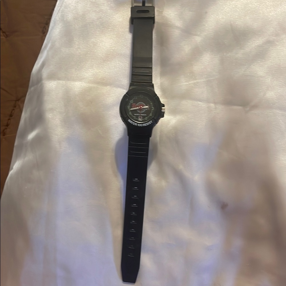 Black Swatch Watch with Red Accents